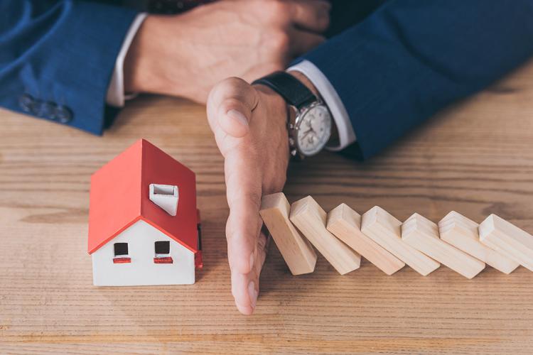 Protecting House Model Falling Wooden Blocks