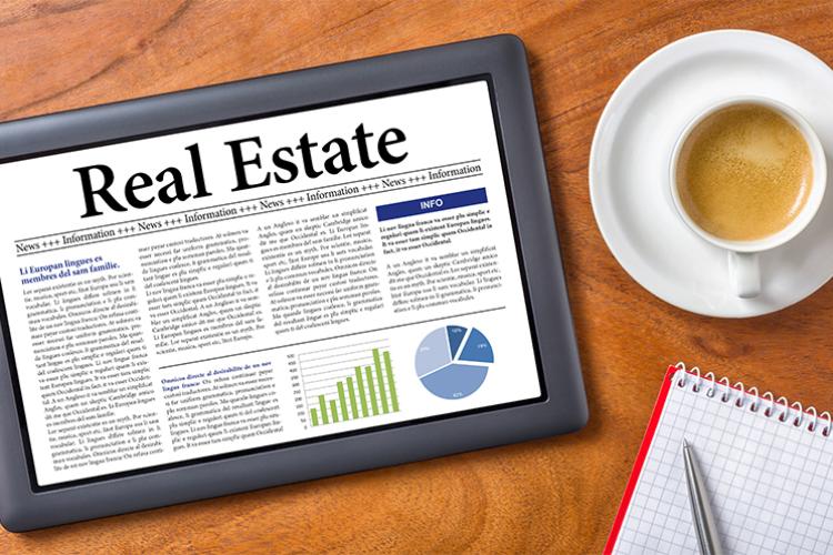 Tablet on a desk - Real Estate 